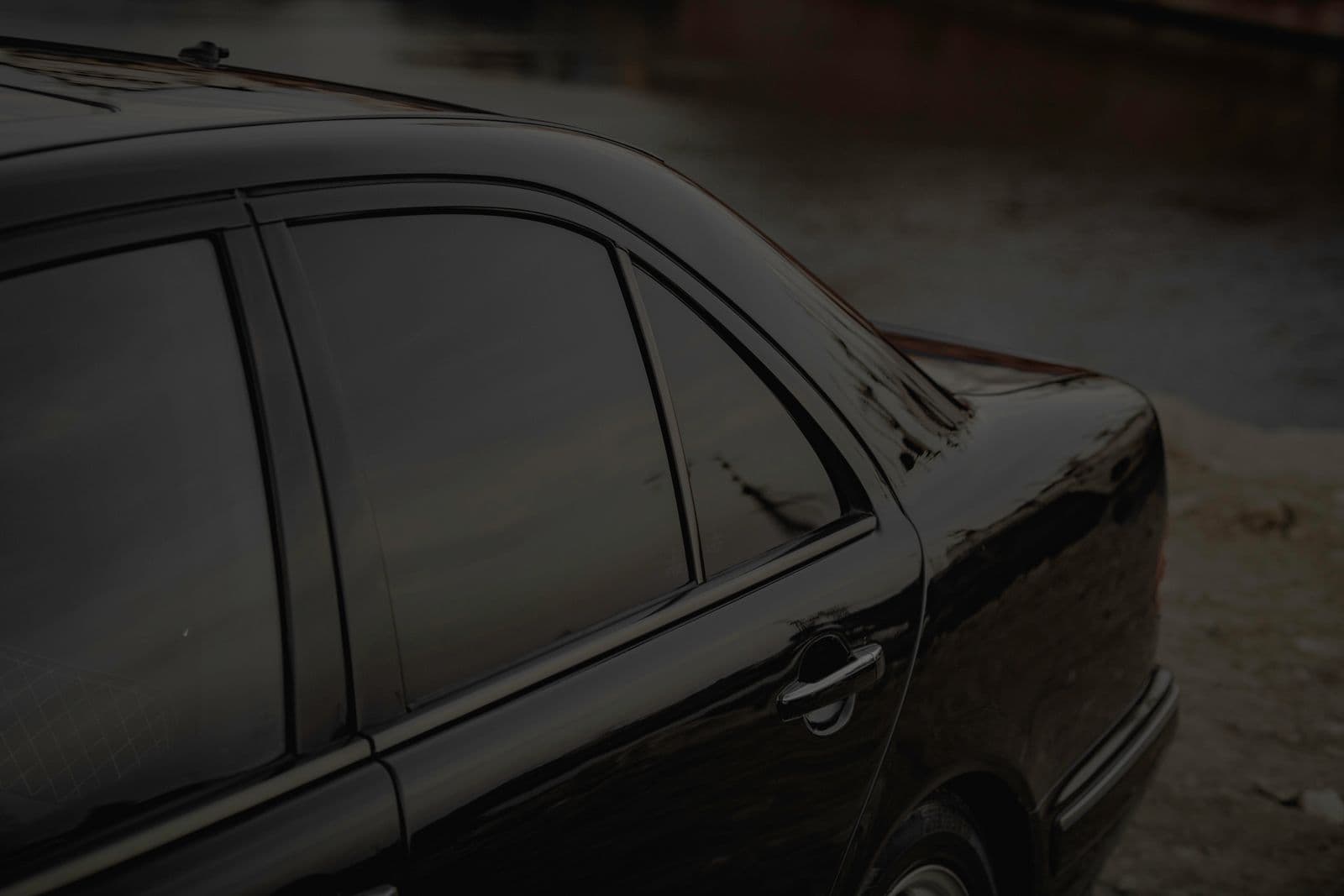 Black Mercedes with tinted windows